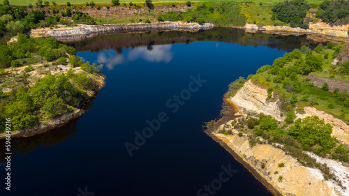 Aerial view of the Lovers Lake. The Lago degli Innamorati is located in Pomezia solfatara  in the Metropolitan City of Rome  Italy. It is part of a volcanic area.