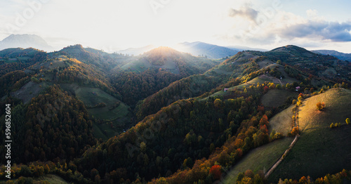 Panorama of the mountains in autumn at sunset, Poiana Marului in Transylvania © Radu