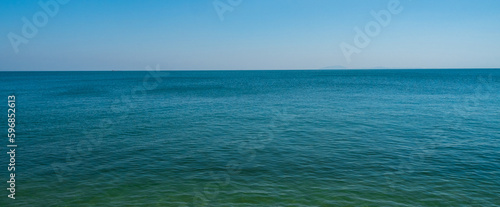 Panorama front view landscape Blue sea and sky blue background morning day look calm summer Nature tropical sea Beautiful ocen water travel "Bangsaen Beach" East thailand Chonburi Exotic horizon.