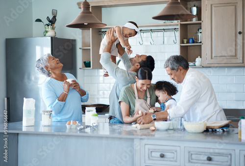 The kitchen is our favourite place to be. Shot of a multigenerational family baking together in the kitchen.