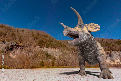 triceratops is calling up the others in winter times with copy space © DM7