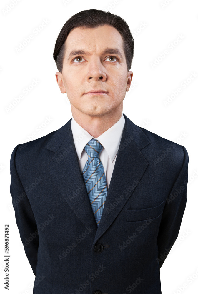 Business man standing in a business suit and thinking Business man standing in a business suit and thinking