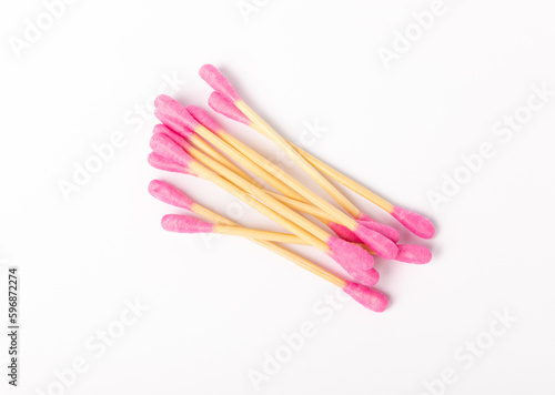 New clean cotton swab isolated on white background. Close-up.