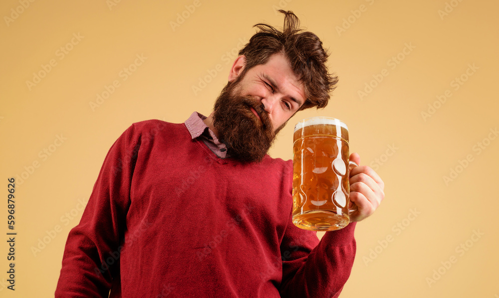 Celebration oktoberfest festival. Drunk man with craft beer mug. Man drinking beer. Germany traditions. Bearded hipster with glass of delicious beer. Pub and bar. Brewery concept. Alcohol and leisure. Celebration oktoberfest festival. Drunk man with craft beer mug. Man drinking beer. Germany traditions. Bearded hipster with glass of delicious beer. Pub and bar. Brewery concept. Alcohol and leisure.