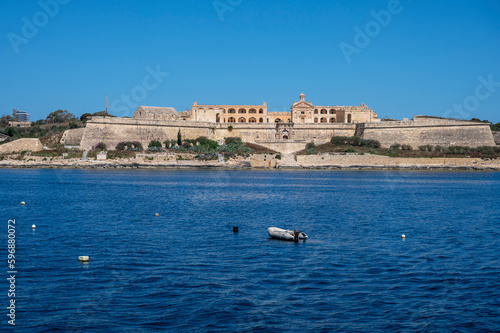 Rocky coastline of Marsaxlokk, Malta island