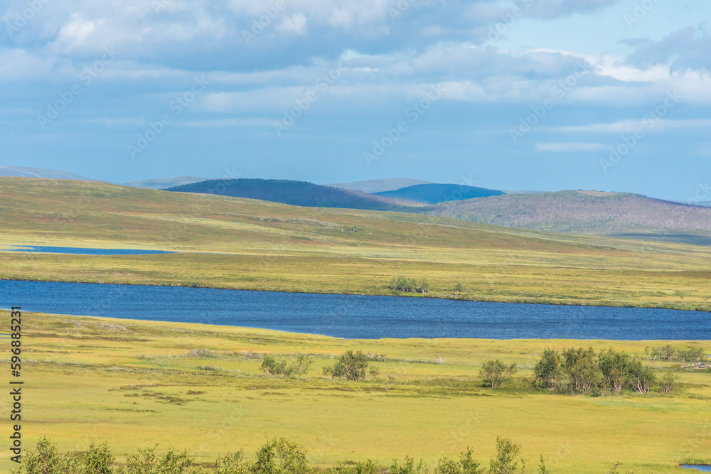 Landscape of  the tundra with a lake in the Finnmark province of Norway