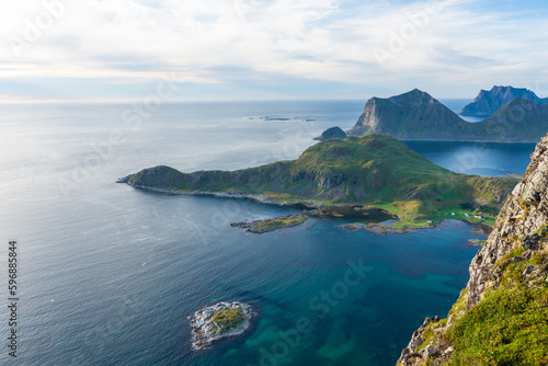 Fototapeta Naklejka Na Ścianę i Meble -  Beautiful landscape of the Lofoten Islands during the golden hour, view from Offersoy Mount trail,  Norway