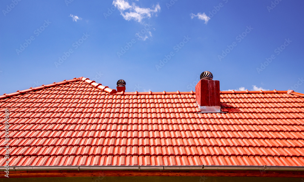 new red tiles roof and blue sky new red tiles roof and blue sky