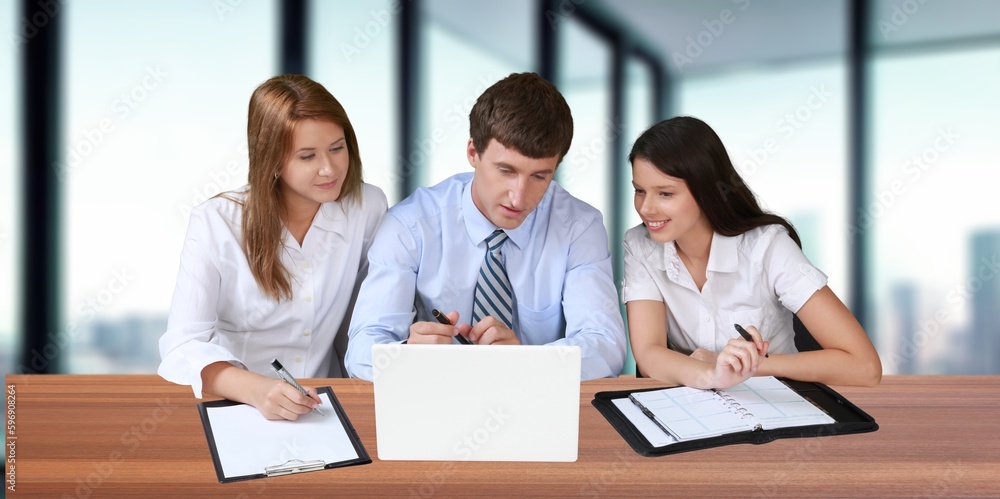 Business people chatting together, teamwork at workplace