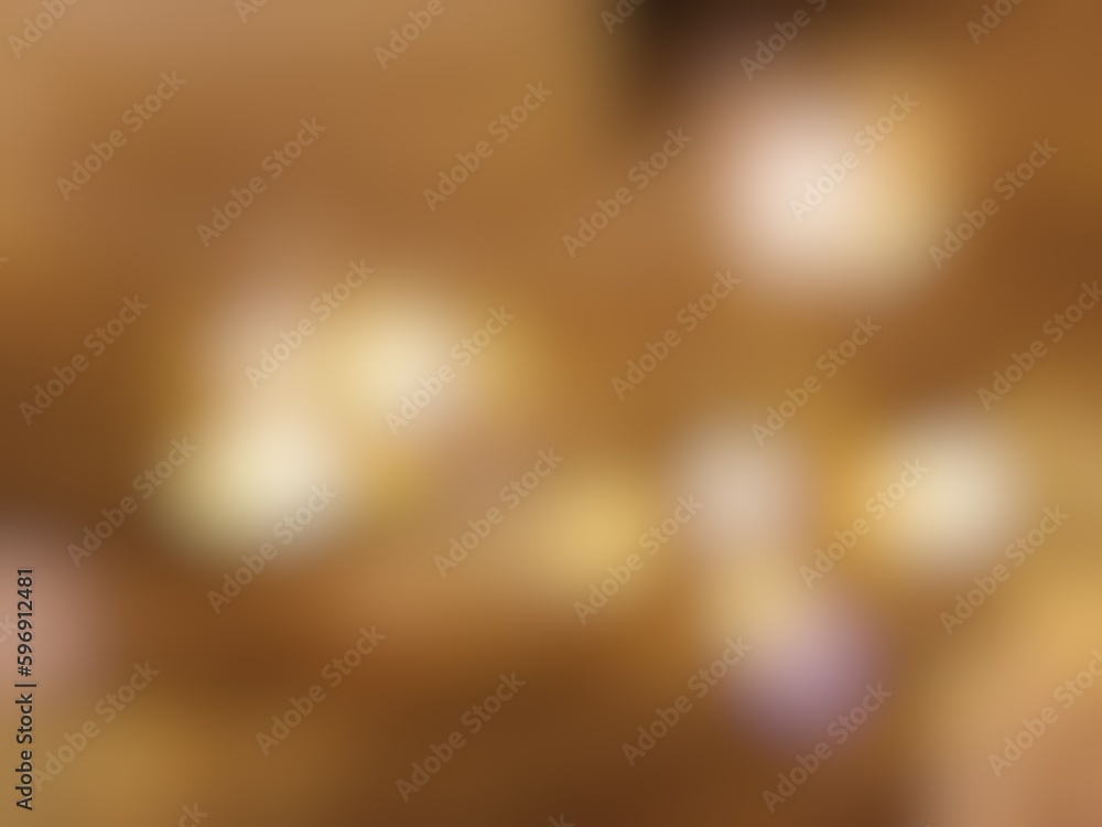 Abstract blur background image of gold color gradient used as an illustration. Designing posters or advertisements. Abstract blur background image of gold color gradient used as an illustration. Designing posters or advertisements.