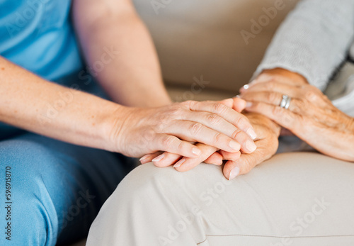 All it takes to change a life is some kindness. Closeup shot of an unrecognisable nurse holding a senior womans hand in comfort.