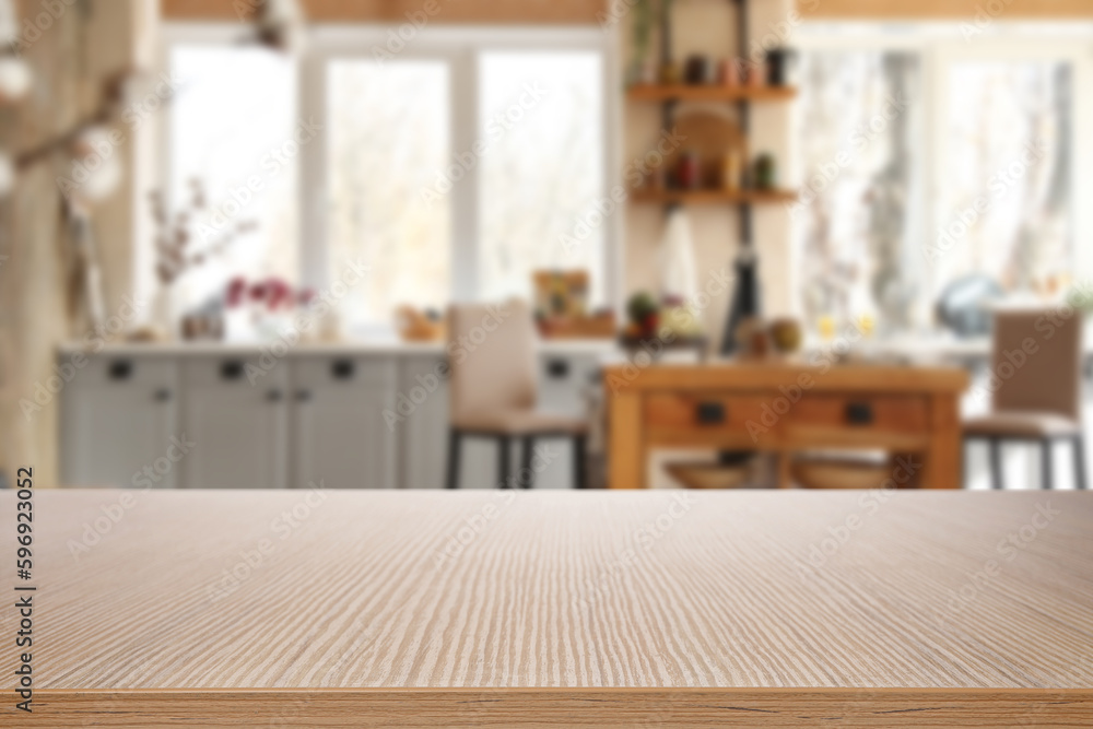 Empty wooden table in beautiful kitchen. Space for design Empty wooden table in beautiful kitchen. Space for design