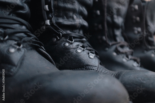closeup of a black military leather combat boots
