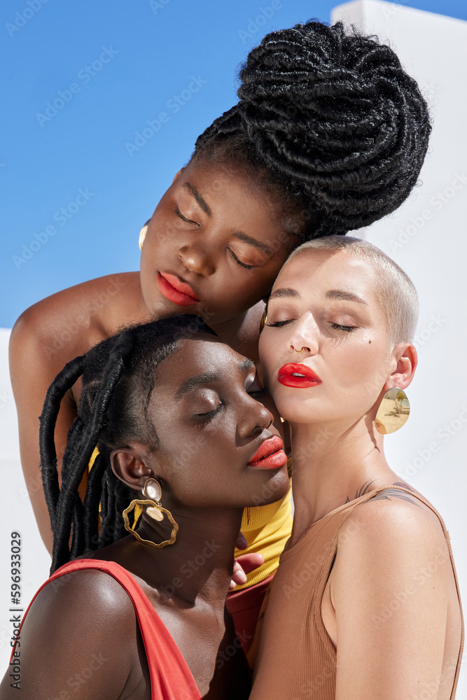 Its a matter of womanhood. Cropped shot of three attractive young women posing on a rooftop outdoors. Its a matter of womanhood. Cropped shot of three attractive young women posing on a rooftop outdoors.
