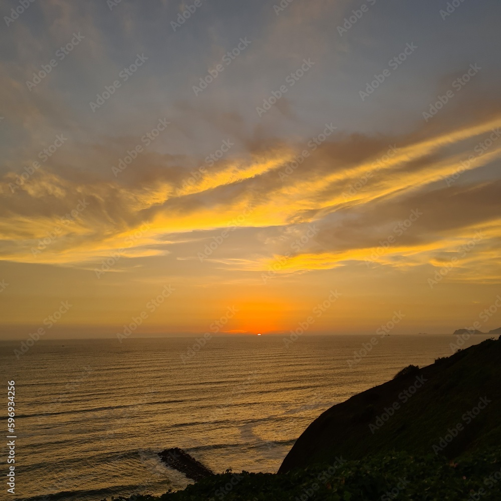 sunset over the sea in Lima