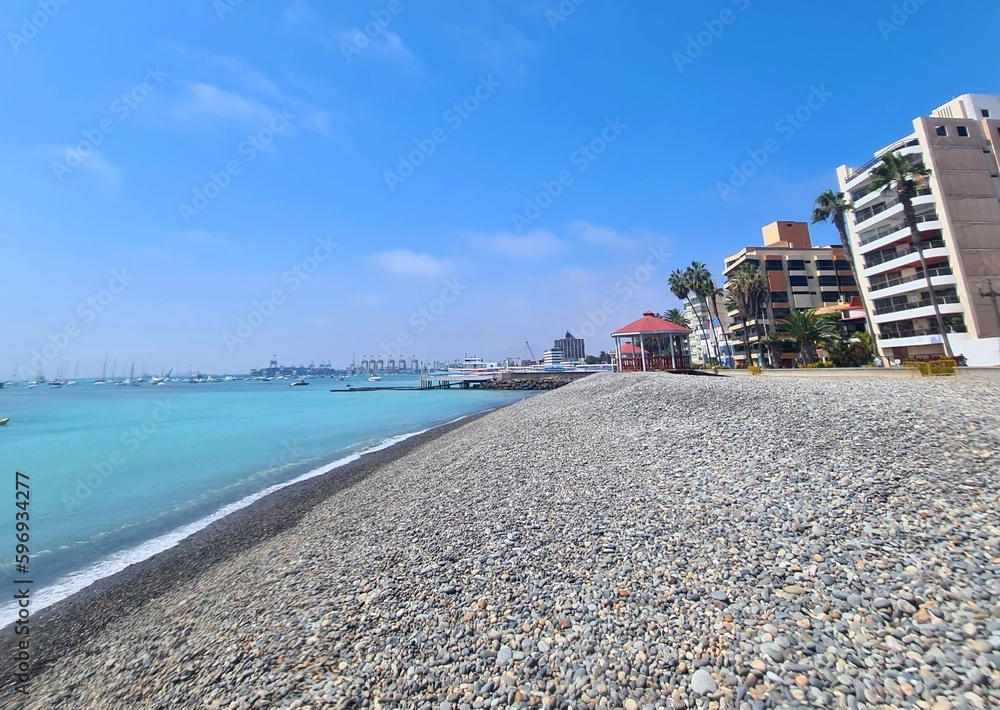 view of the rocky beach and turquoise sea of La Punta - Callao - Peru