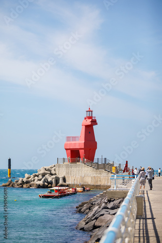 Wonderful Iho Tewoo Beach two horse shaped lighthouses. Jeju Island, South Korea