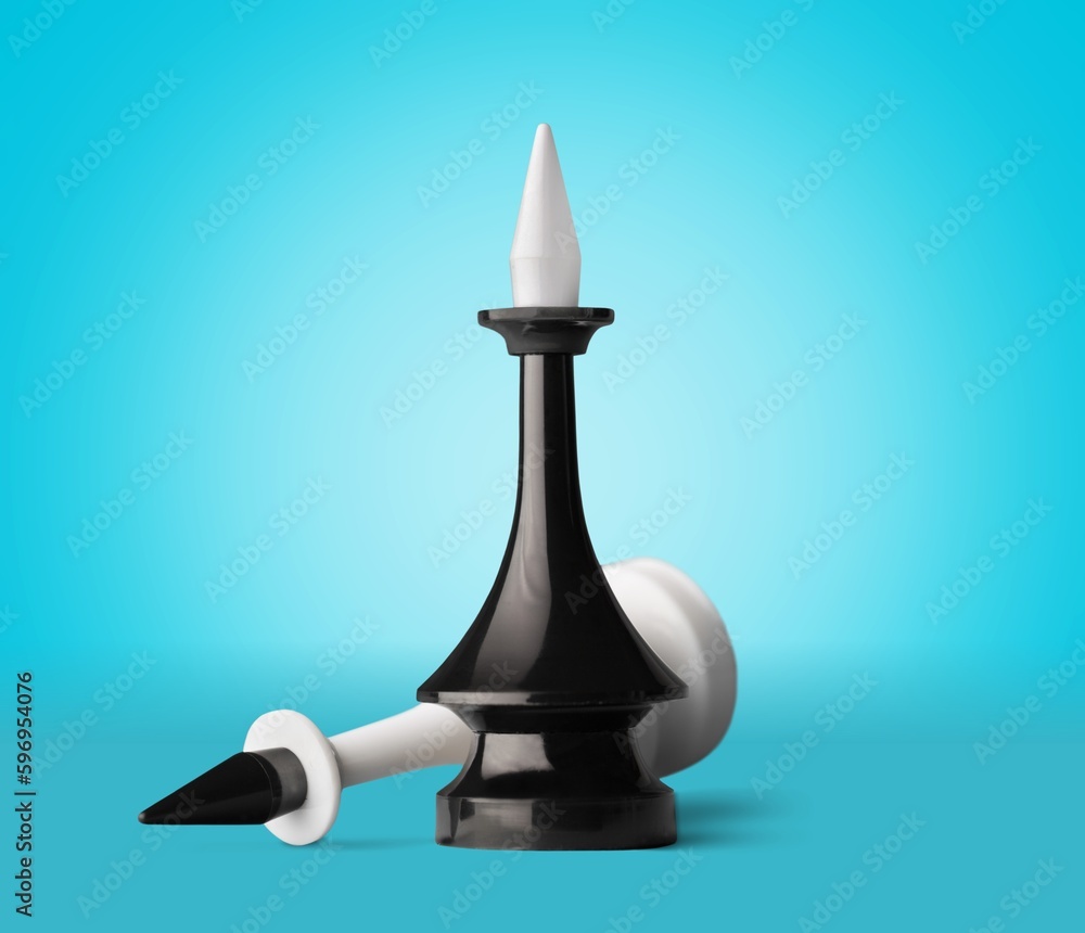White and black classic chess figures on blue background White and black classic chess figures on blue background