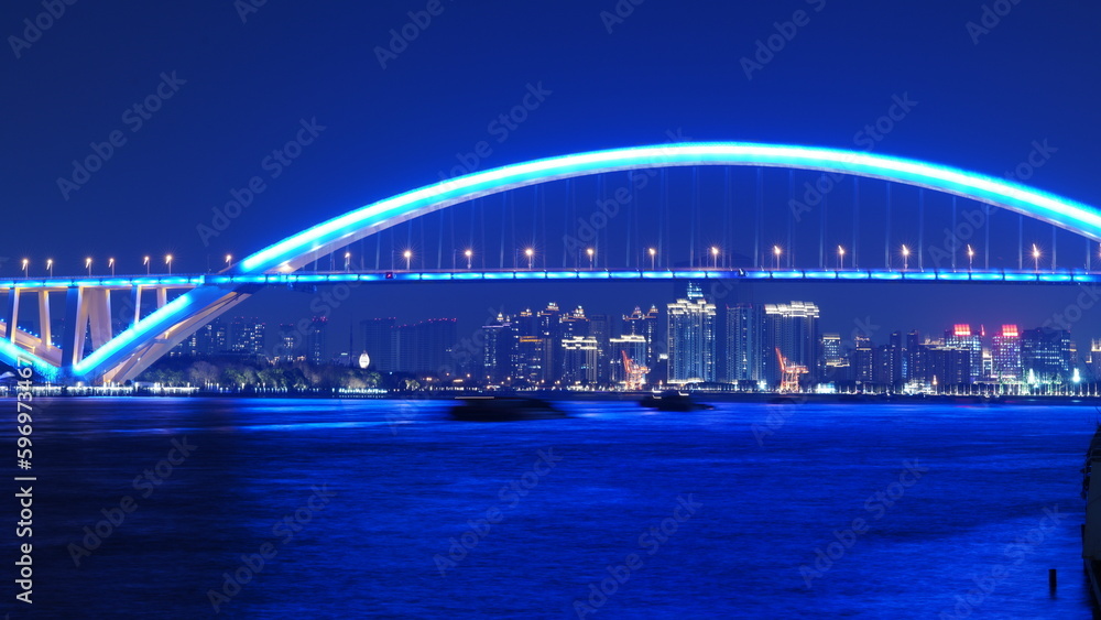 Fototapeta premium The beautiful city night view with the lights on in the evening