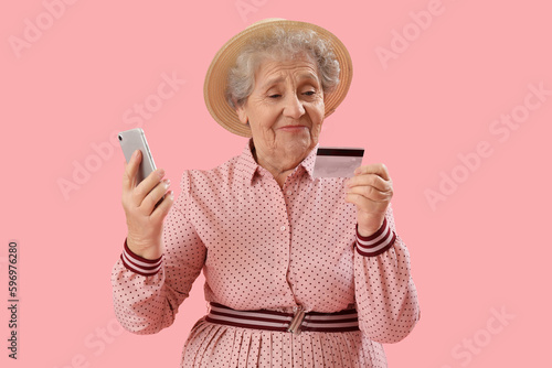 Senior woman with mobile ph...