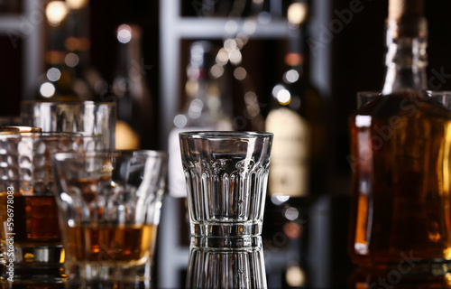 Empty glass on table in bar