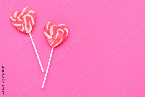 Heart shaped lollipops on p...