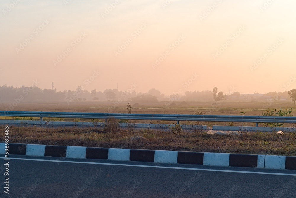 sunset view from national highway in India towards the horizon