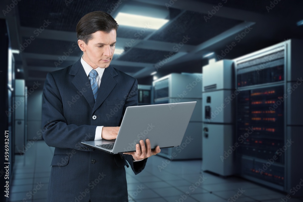 Data Center Technology business man Holding Laptop Data Center Technology business man Holding Laptop