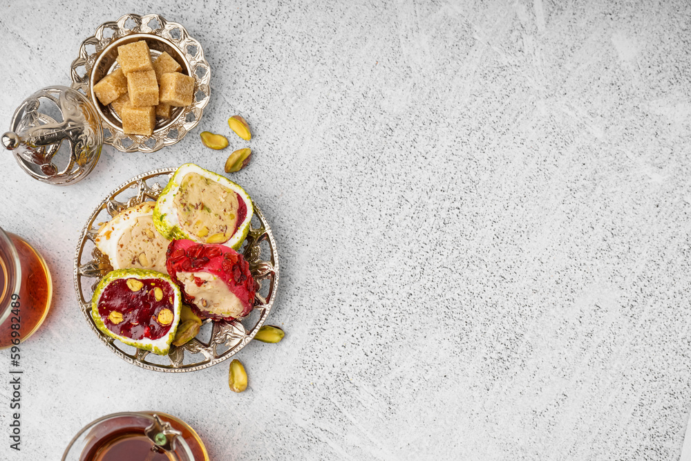 Plate with tasty Turkish Delight on light background Plate with tasty Turkish Delight on light background