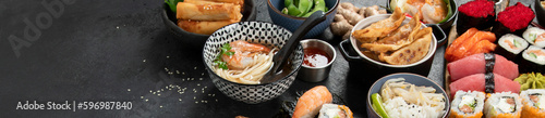 Traditional Japanese food dishes on black background