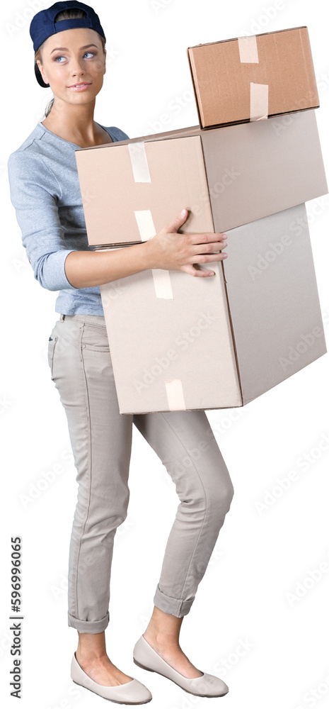 Woman moving into new house on background, holding boxes Woman moving into new house on background, holding boxes