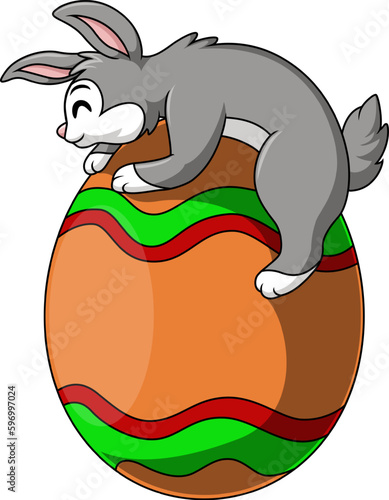 Cute little white bunny with Easter egg