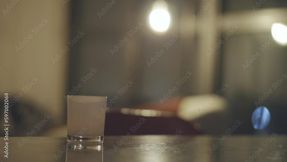 Scented Candle On Wooden Table Inside The House At Night. - close up Scented Candle On Wooden Table Inside The House At Night. - close up