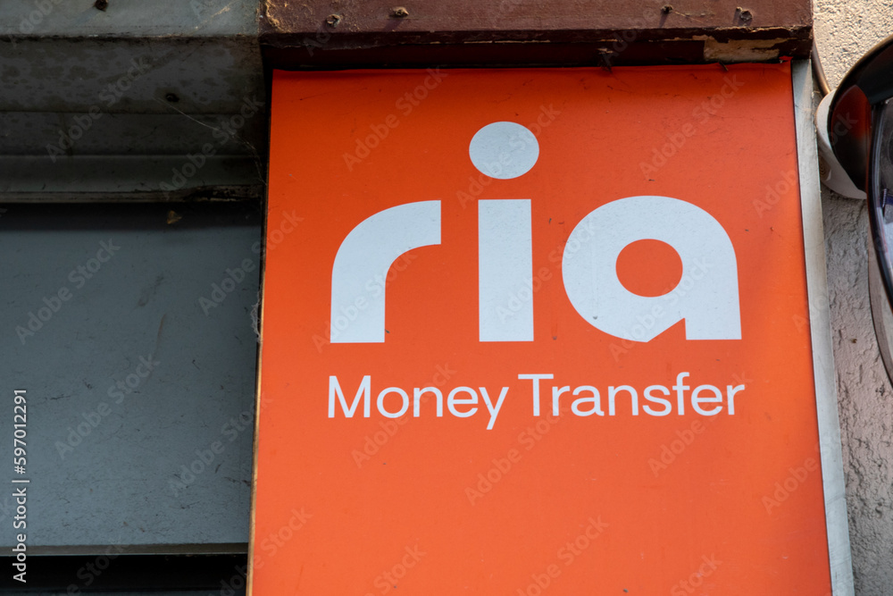 Ria Money Transfer Text Brand And Sign Logo Facade Wall Agency Money ria-money-transfer-text-brand-and-sign-logo-facade-wall-agency-money