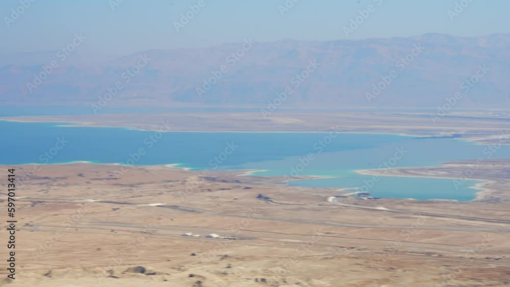 Aerial shot of stormy land in summer, drone flying over the landscape - Dead Sea, Israel Aerial shot of stormy land in summer, drone flying over the landscape - Dead Sea, Israel