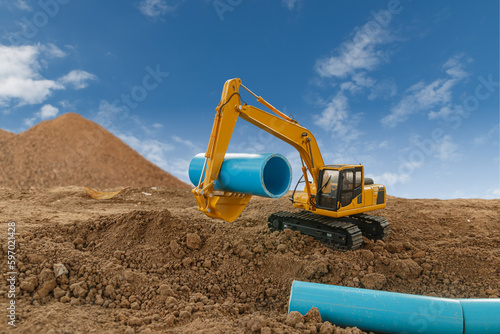 Wallpaper Mural Crawler excavators are digging soil at construction site and laying pipe. with clouds and blue sky backgrounds. Torontodigital.ca
