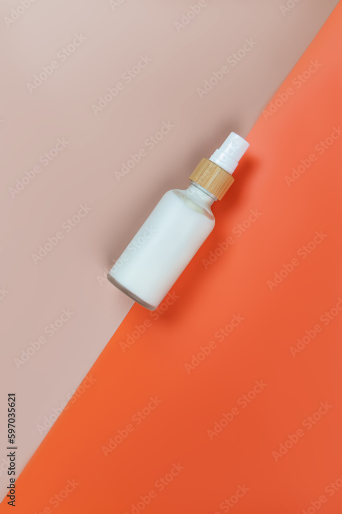 Pump jar made of frosted glass with face cream or mask for skin care. Daily routine product, unbranded package mockup. Pump jar made of frosted glass with face cream or mask for skin care. Daily routine product, unbranded package mockup.