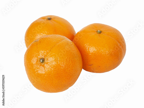 Mandarin fresh orange on white background. Closeup photo, blurred.