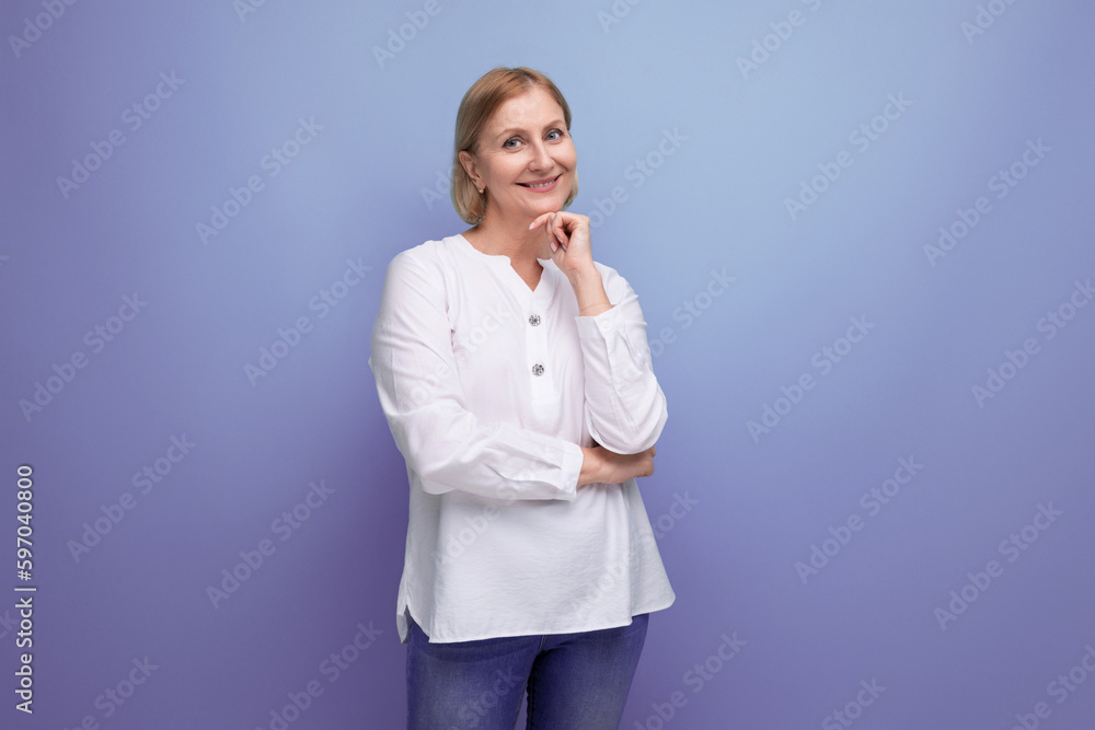 beautiful cute blond middle aged woman in white blouse in premenopausal age beautiful cute blond middle aged woman in white blouse in premenopausal age