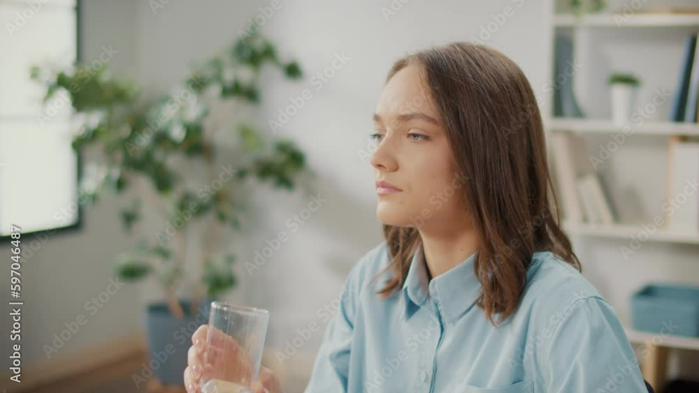 A Young Office Worker Coughed While Drinking Water at Work. A Young Woman Drinks Water Too Quickly.She is Too Busy to Take a Break for a Glass of Water. Work Load.Health and Well-being in Remote Work. A Young Office Worker Coughed While Drinking Water at Work. A Young Woman Drinks Water Too Quickly.She is Too Busy to Take a Break for a Glass of Water. Work Load.Health and Well-being in Remote Work.