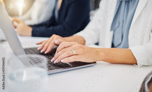 Laptop  hands of business woman in office for research  planning and email. Website  online report and technology with closeup of female employee typing in meeting for idea  internet and digital