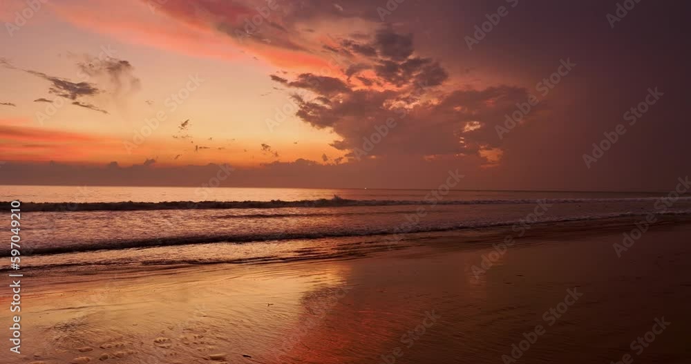 aerial view wave after wave swept towards the shore in beautiful sky. .Landscapes view of beach sea sand and wave in sunset. .Beach sea space area. waves crashing at Natai Beach, Phang Nga Thailand. aerial view wave after wave swept towards the shore in beautiful sky. .Landscapes view of beach sea sand and wave in sunset. .Beach sea space area. waves crashing at Natai Beach, Phang Nga Thailand.