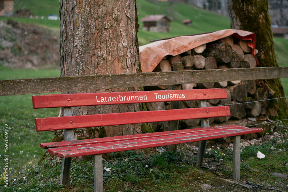 Naklejka premium empty bench in the Swiss Alps mountains.
