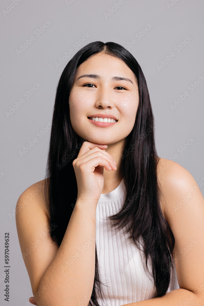 Close up shot selective focus on beautiful stunning white teeth smiled delighted cheerful woman with brighten teeth looking at camera lauging girl with adorable smile. Asian girl womn wih long hair. Close up shot selective focus on beautiful stunning white teeth smiled delighted cheerful woman with brighten teeth looking at camera lauging girl with adorable smile. Asian girl womn wih long hair.