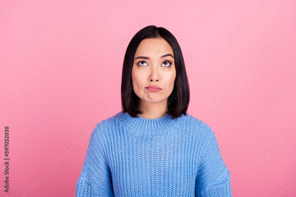 Portrait of minded girl look interested up above empty space contemplate isolated on pink color background Portrait of minded girl look interested up above empty space contemplate isolated on pink color background