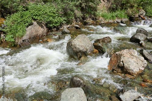 Running water in a mountain river, close-up.
