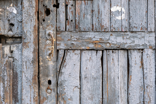 Old wooden door with cracked paint