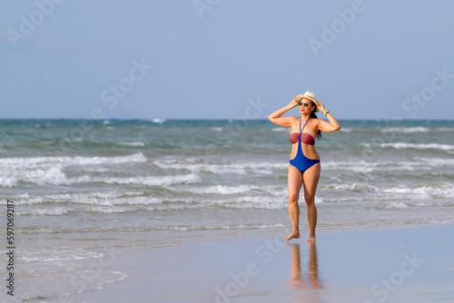 Woman body big with swimsuit stand sexy at beach