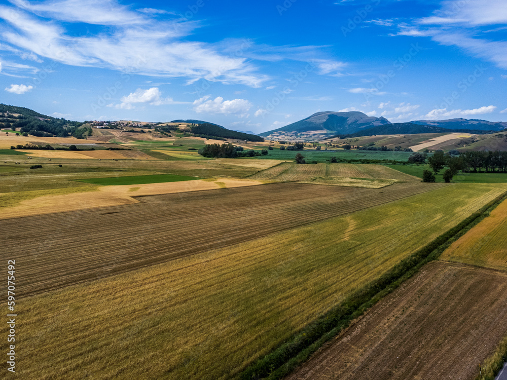 Colfiorito, Umbria. Fields and crops. Play of colors seen from above.