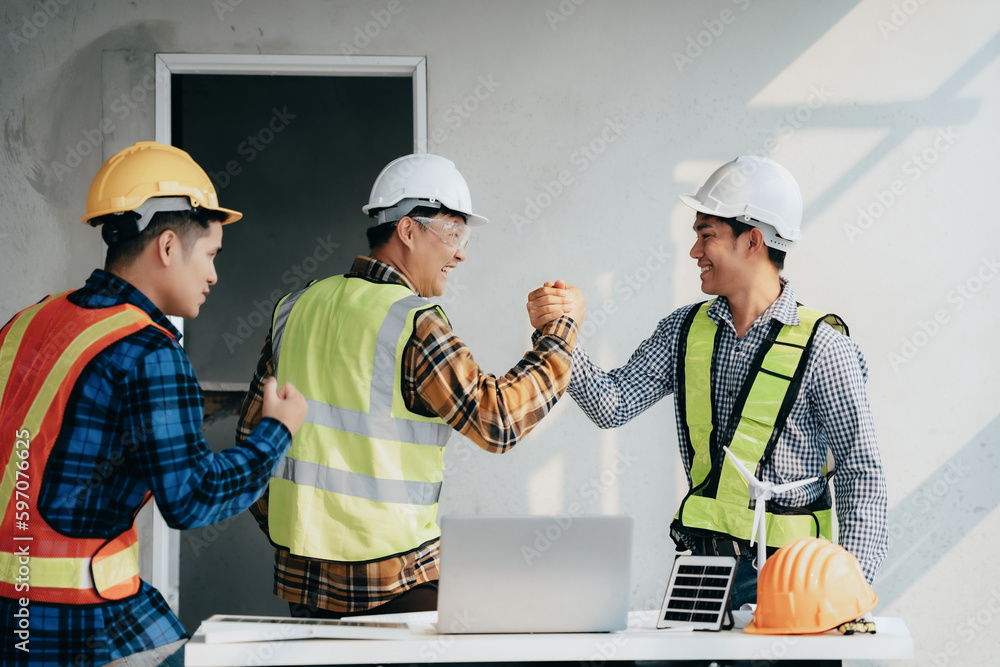 Team architects workers, join hands to join forces to join forces to work for success. Teamwork and professional colleagues : Workers' hands, teamwork concept. Team architects workers, join hands to join forces to join forces to work for success. Teamwork and professional colleagues : Workers' hands, teamwork concept.